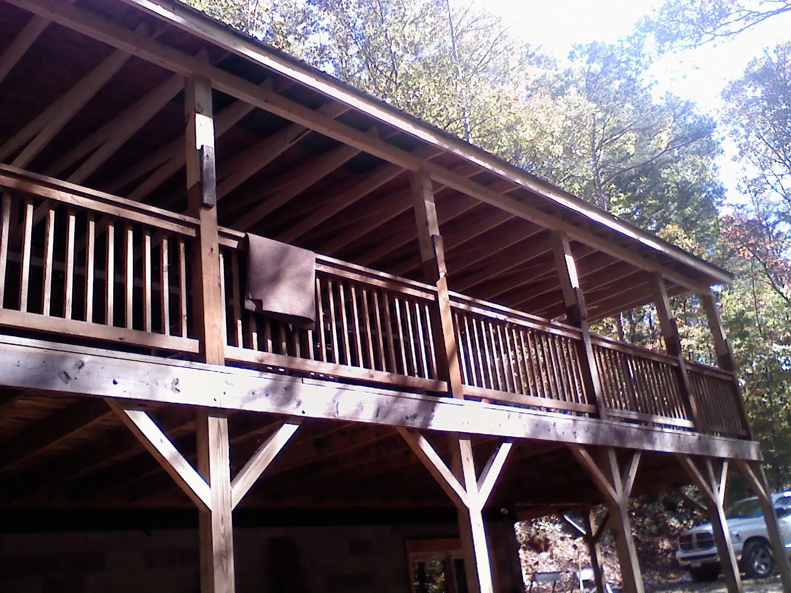 Timber framing under a new elevated porch and deck — Roof Leak Repair in Bloomington by Roofing Brothers